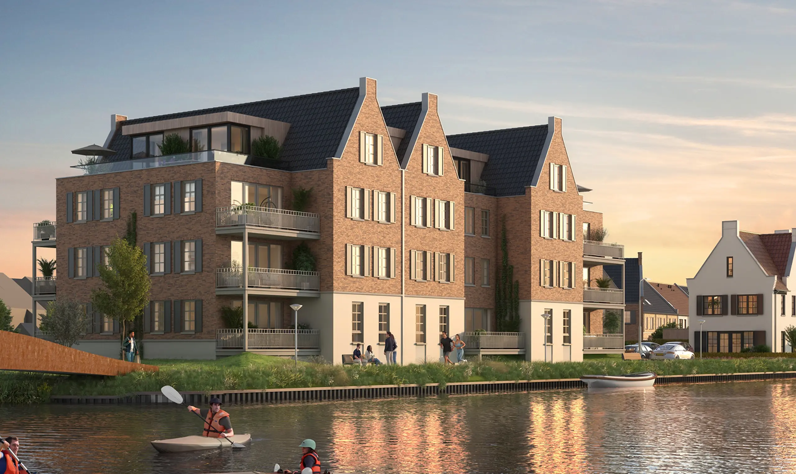 Woningen aan het water met een treurwilg